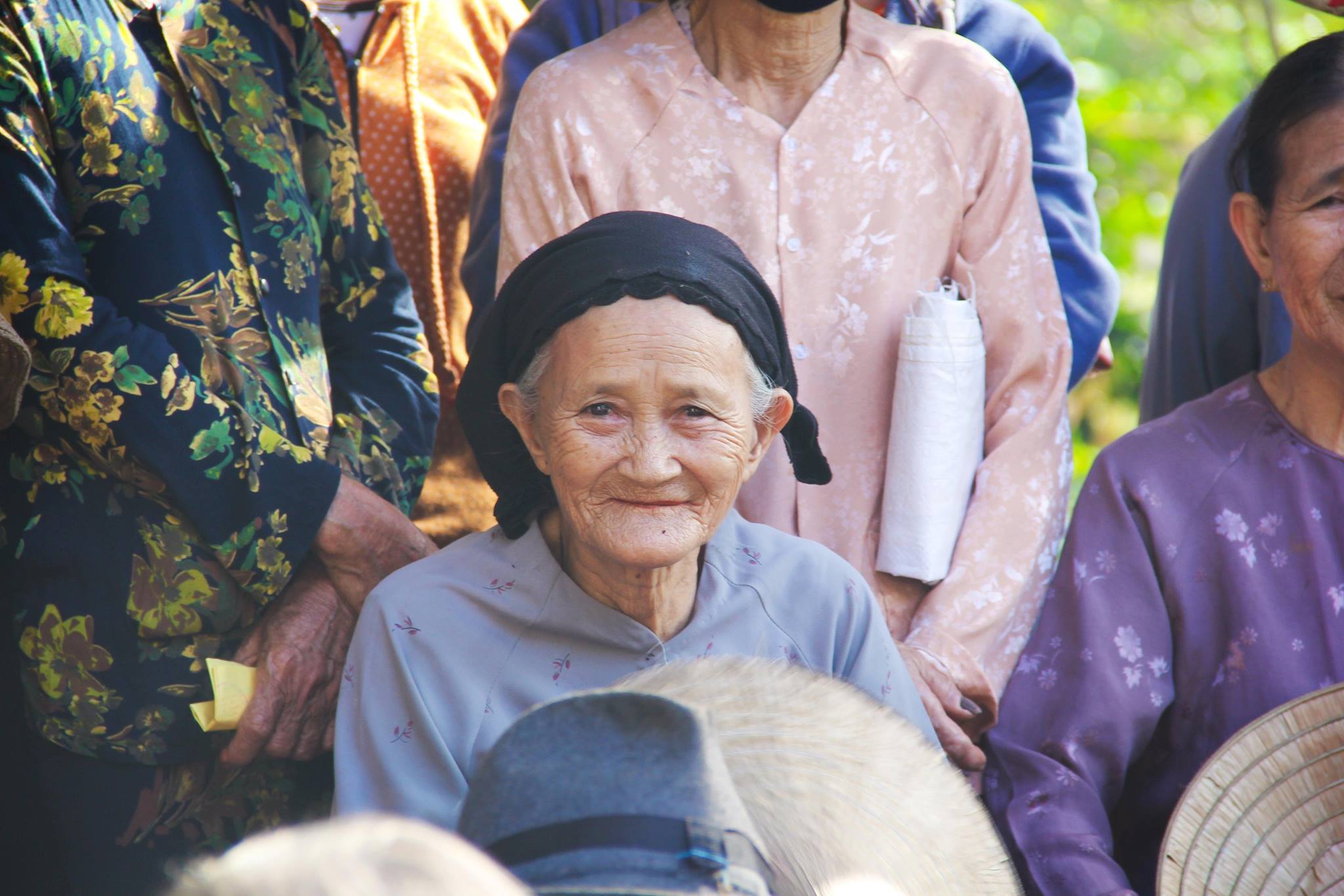 Nụ cười của cụ rất phúc hậu